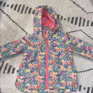 Floral rain coat sz. 2/3